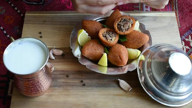 Traditional Turkish Foods; "icli kofte" Stuffed meatballs with minced meat and bulgur fried in oil. Kibbeh or kibbe
