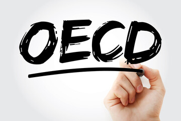 OECD - Organisation for Economic Co-operation and Development acronym with marker, business concept...