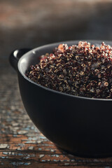Bowl full of hydrated quinoa with sprouts