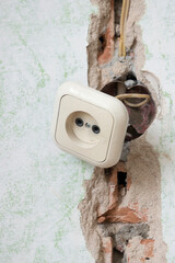 one danger socket fell out of the wall.