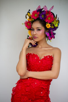 Beautiful Asian woman in red dress