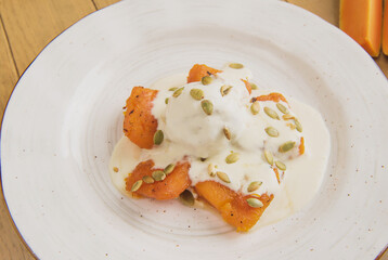 ice cream with caramelized pumpkin and pumpkin seeds