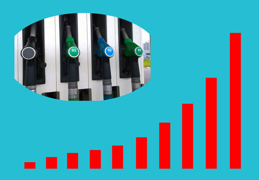 Fuel dispensing pumps on blue background with growing business graph chart red color. Petrol station. Gasoline service station. Oil and gas price concept. Nozzle. World market. Copy space.
