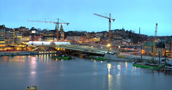 Construction of a new bridge in Slussen in central Stockholm during nightfall, Sweden
