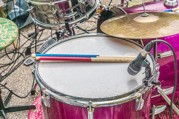 Fototapeta na wymiar Drum sticks lie on a drum, sticks, concert.