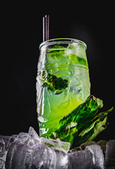 Iced Matcha Basil Lemonade on black background