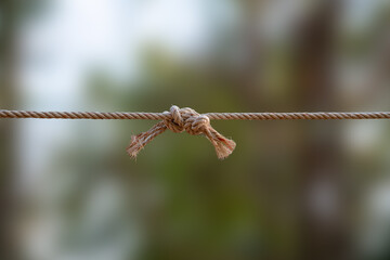 Rope knot with blurry background.
