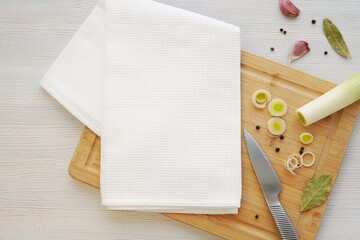 White waffle kitchen towel mockup, blank kitchen towel for sublimation design presentation, flat lay, wooden cutting board.