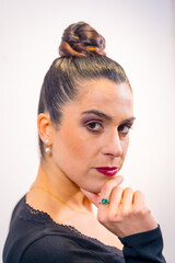 Studio photoshoot with white background, portrait of a brunette Caucasian girl with seductive looks