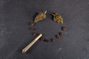 Coffee smile of cannabis with joint - stoned face made of weed and coffee beans