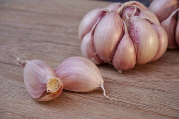 Garlic on wooden background