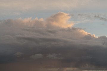 clouds on evening sky with sunset light