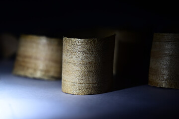 brown wooden rolls on white surface 