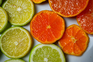 citrus fruit cut on a white plate