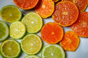 citrus fruit cut on a white plate