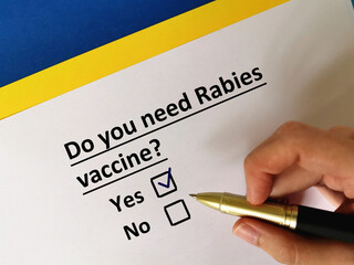 One person is answering question about vaccines. He needs rabies vaccine.