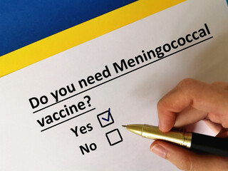 One person is answering question about vaccines. He needs meningococcal vaccine.