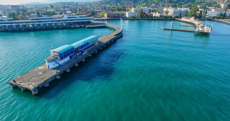 Aerial view of the cityscape overlooking the sea station.