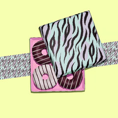 3d render fashion collage scene..Chocolate glaze black and white donuts in animal print design box. Donut lover concept. Minimalistic creative food style art.