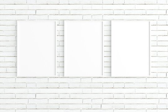 Three empty photo frame for mockup on white brick wall, 3D render, 3D illustration.