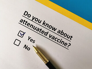 One person is answering question about vaccines. He knows about attenuated vaccine.