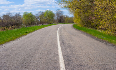 asphalt rural road turn, summer outdoor background
