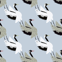 Cartoon animal seamless pattern with hand drawn crane bird print. Light blue background. Chinese design.