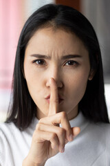 Naklejka premium woman asking for silence, concept of no noise or stop fake news concept