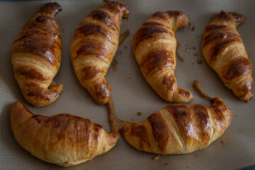 Fresh tasty croissants. Breakfast meal. Top view flat lay