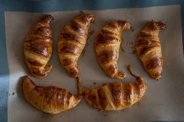 Fresh tasty croissants. Breakfast meal. Top view flat lay