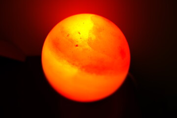 Sun at the center of the darkness of our universe