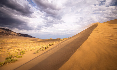 Singing sand dune in Altyn-Emel National Park, Kazakhstan
