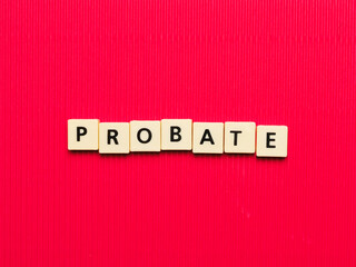 PROBATE word made from square letter tiles on red background.