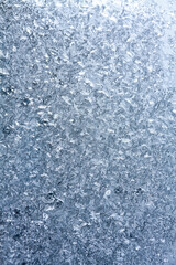 a winter window covered by frost