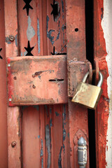 An old locker steel door printed in red