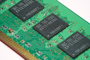 Close up shot of laser engraving on memory chip of a RAM.