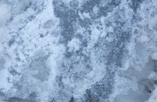 Blue wet winter snow close-up photo texture background