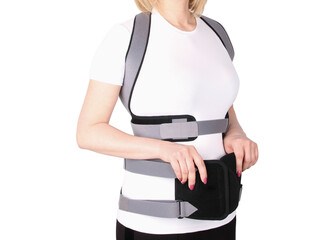 Orthopedic lumbar corset on the human body. Back brace, waist support belt for back. Posture...