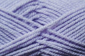 Close up sur les fils d'une pelote de laine