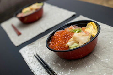 Bowl with japanese food over the table