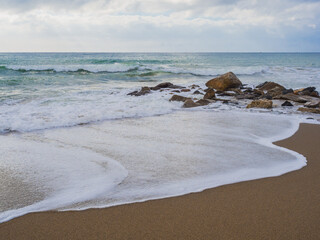 View of rock on the shore of a beach of the Mediterranean Sea