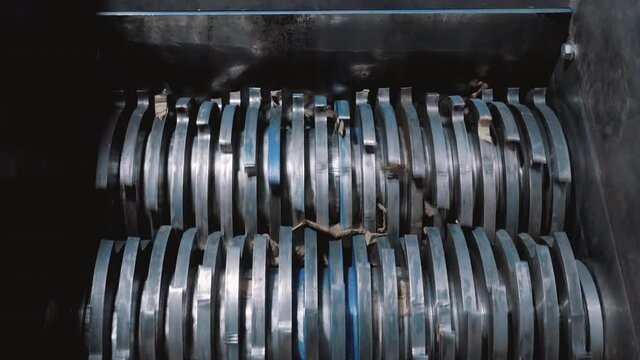 Garbage shredder. Recycling of recyclable materials. Waste paper shredding
