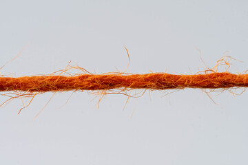 red rope against white background