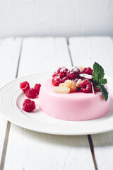 Raspberry panna cotta dessert.