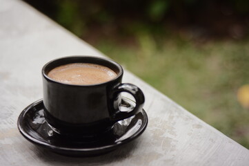 cup of coffee on a table
