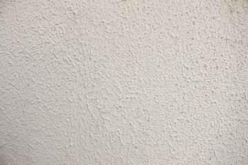 Cream color wall with rough texture
