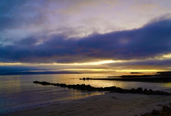 Obraz premium Atmospheric Sunset piers at Salthill promenade