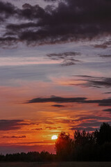 Fototapeta na wymiar red summer sunset in the sky
