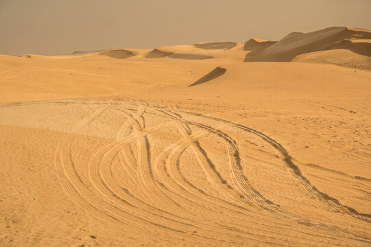 Tire tracks on a sand in desert