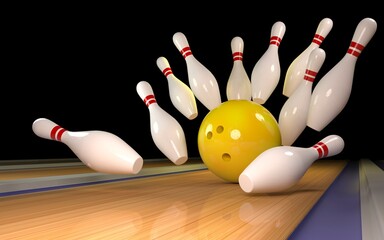 bowling strike. Skittles and bowling ball on the track